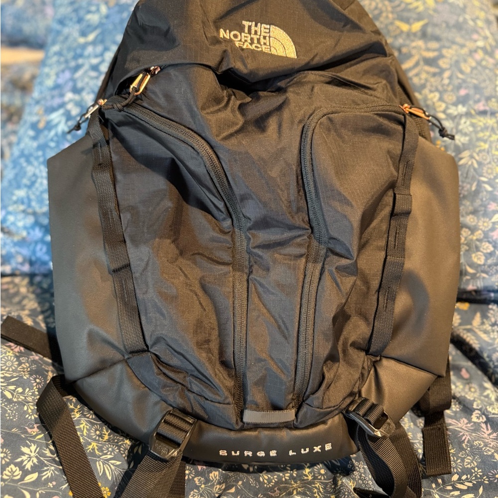 The North Face Black Surge Luxe Backpack Black and burndt coral